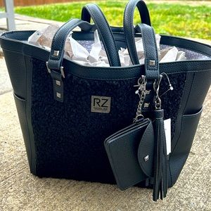 NWT Rachel Zoe tote bag has sherpa/ on both side out side the tote bag.